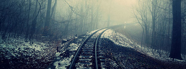 snow-covered train tracks