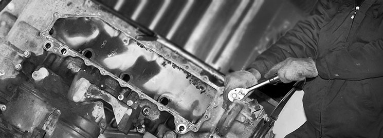 Man fixing an engine