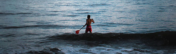 man surfing in the ocean
